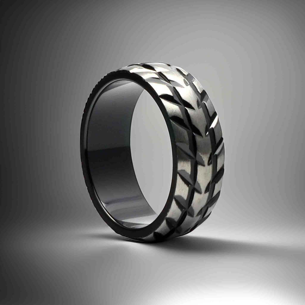 aprilomat mens motorsport wedding band ring tire tread design Gaboni Jewelers